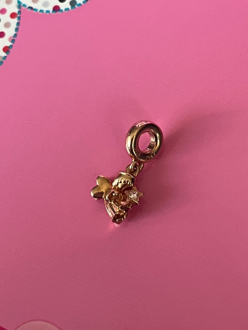 Pandora Angel holding star charm